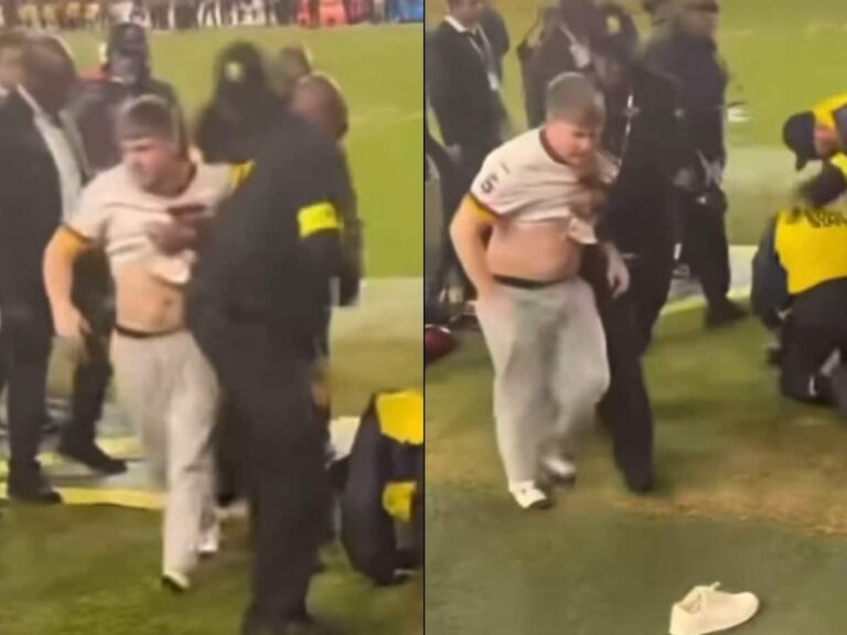 Security-Takes-Down-Commanders-Fan-Who-Ran-Onto-Field-to-Confront-Hogan-Hatten