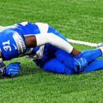 Kerby-Joseph-holds-knee-in-pain