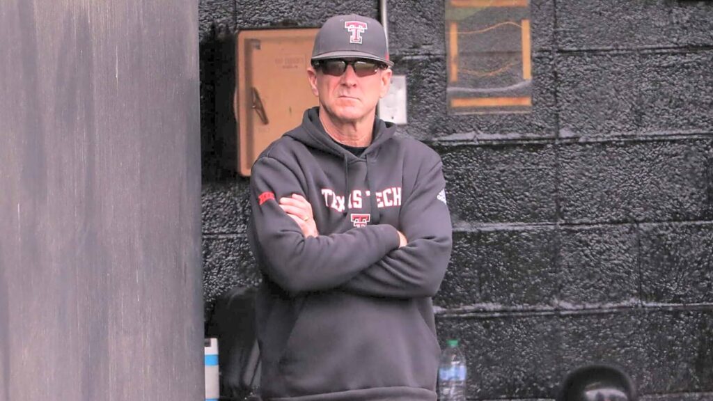 texas-tech-head-coach-tim-tadlock-looks-on-dugout
