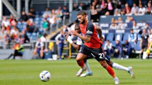 wells-comes-away-with-the-ball-Large-e1772540335648