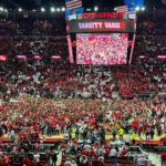 Fans storm the Kohl Center court after Wisconsin beat Michigan State, 92-71, on Feb 13.